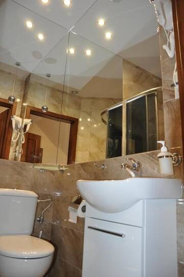 Фото номера Семейный номер с душем Отель Hotel Viwaldi г. Baruchowo 5